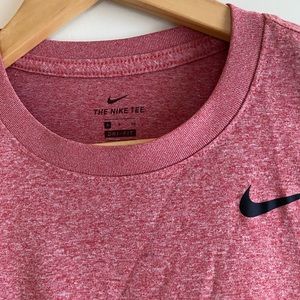 The Nike Tee Women’s Dri-Fit short sleeve tee. Size small.